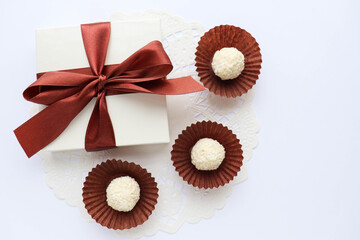 valentine's day background. candies and sweets. gift box, red heart and chocolates