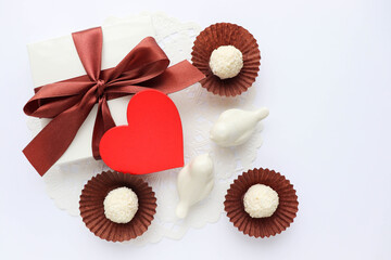 valentine's day background. candies and sweets. gift box, red heart and chocolates