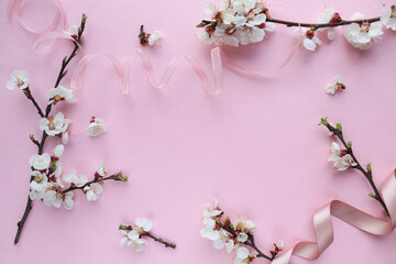postcard layout. spring time. blossoming cherry branch and space for text. congratulation. invitation