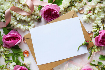 mockup greeting card. spring composition. blooming branch  and envelope for text. congratulation. invitation