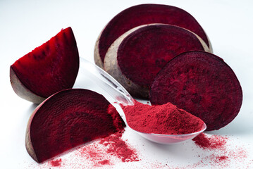 Superfood beetroot powder on a white background. Healthy eating concept dry beet powder.