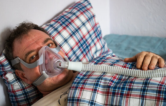 Mature Man In Mask For Cpap Therapy In Bed