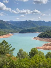 Fototapeta na wymiar view of the Tranco reservoir located in the Sierras de Cazorla, Segura y las Villas Natural Park in Jaen, Spain
