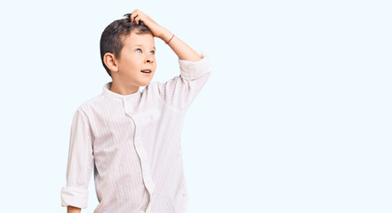 Cute blond kid wearing elegant shirt smiling confident touching hair with hand up gesture, posing attractive and fashionable