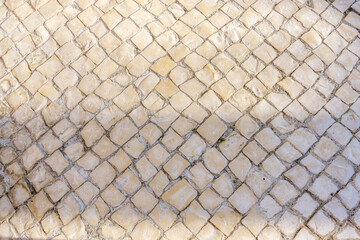 Cobbles background texture..Typical Portuguese Sidewalk.