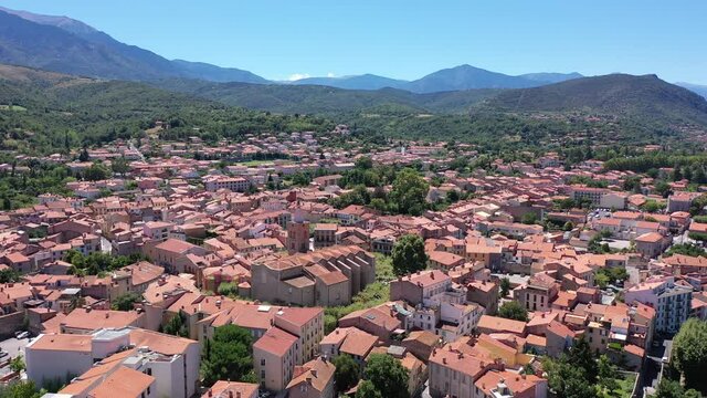 Panoramic aerial view of Prades cityscape with buildings and streets, Tarragona, Catalonia, Spain. High quality 4k footage