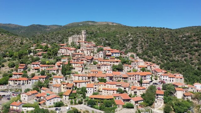 Panoramic view from above on the city Eus. Small town located on high mountain. Eastern Pyrenees. France. High quality 4k footage