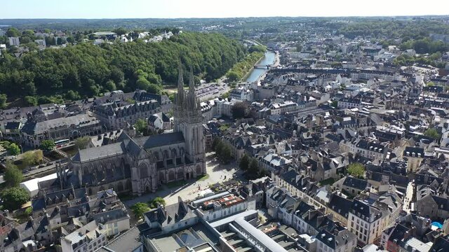 View from drone of old traditional houses in historic part of Quimper town at summer day, France