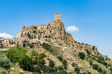 Fototapeta na wymiar View of Craco, a ghost town in Basilicata region abandoned due to natural disasters and now popular tourist destination, Italy