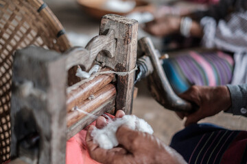 Hand weaving of cotton cloth by hill tribes of northern Thailand.
