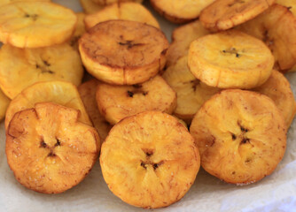 Tostones, patacones, fried green bananas, fried green platains, frito verde. 