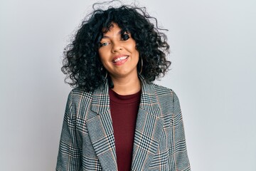 Young hispanic woman wearing business clothes with a happy and cool smile on face. lucky person.