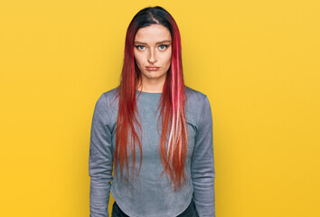 Fototapeta premium Young caucasian woman wearing casual clothes depressed and worry for distress, crying angry and afraid. sad expression.