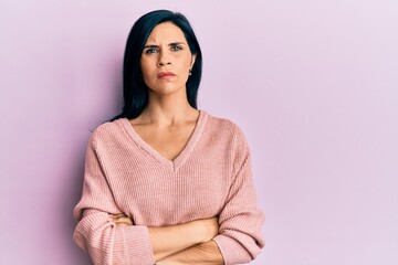 Fototapeta premium Young caucasian woman wearing casual clothes skeptic and nervous, disapproving expression on face with crossed arms. negative person.