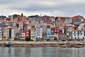 Fototapeta na wymiar Multicolored buildings on the coast line of A Guarda Pontevedra Spain
