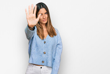 Young woman wearing casual clothes doing stop sing with palm of the hand. warning expression with...