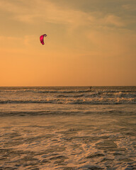 kite on the beach at sunset