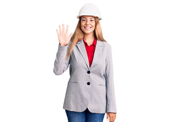 Beautiful young woman wearing architect hardhat showing and pointing up with fingers number five while smiling confident and happy.