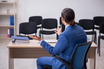 Young businessman making presentation during pandemic