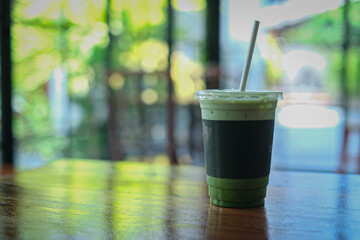 glass of milk
Iced Green Tea  on the table