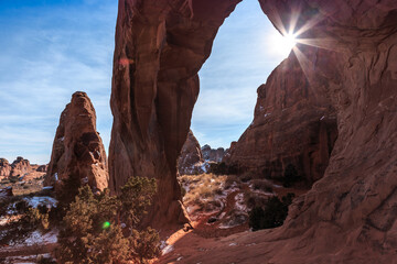 Sunbeam through Pine Tree Arch, Arches National Park, Utah