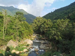 Fototapeta na wymiar River flowing through Nilgiri Mountains in Manjur or Manjoor Tamilnadu,India.