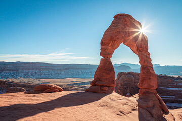 Fototapeta na wymiar Sunbeams on Delicate Arch, Arches National Park, Utah