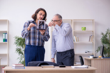 Two employees and meditation balls in the office