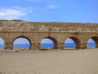 Roman aqueduct on a beach in Israel 