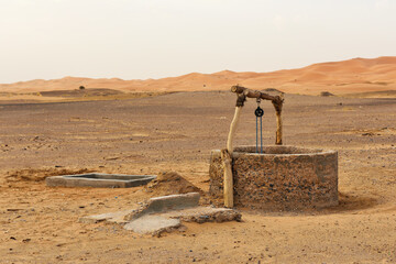 Old Water well in Sahara Desert - 406303687