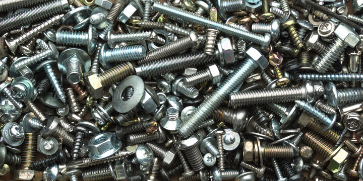Various types of bolts and nuts of different sizes.