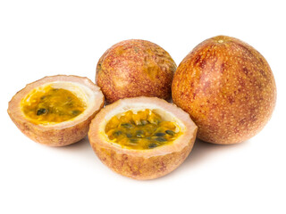 Whole passionfruit and a half maracuya fruit (Passiflora edulis) isolated on white background