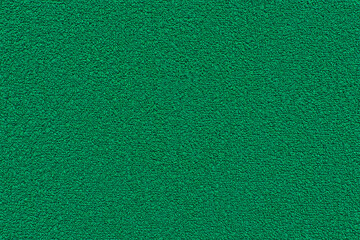 Green terry towel background. Texture of terry cloth - obrazy, fototapety, plakaty