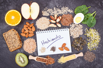 Notepad with inscription hashimoto and best ingredients for healthy thyroid