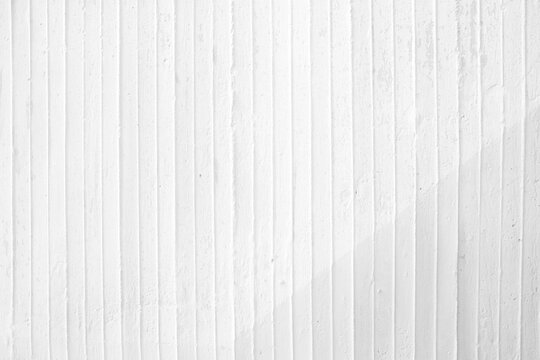 White Concrete Wall Background in Vertical Stripe Lines.