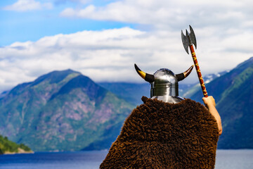 Viking warrior on fjord shore, Norway