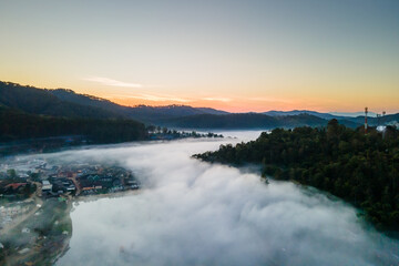 Nature Lighting in the morning after wake up, Town in fog at North of THAILAND.(Selective Focus)