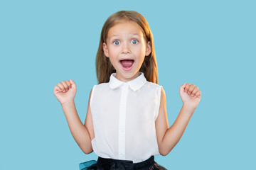 Amazed child. Perfect result. Wow reaction. Portrait of surprised astonished excited sweet little...