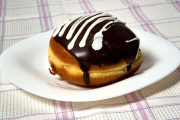 Delicious air donut on fabric background.