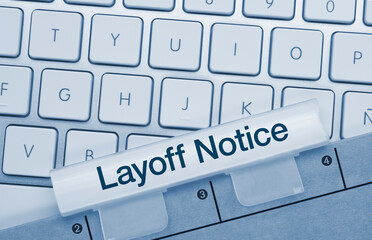 Layoff Notice - Inscription on Blue Keyboard Key.