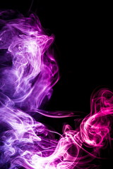 Colored smoke on black background