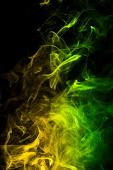 Obraz premium Colored smoke on black background