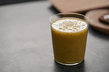Fresh mango lulo smoothie on kitchen countertop
