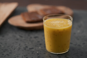 Fresh mango lulo smoothie on kitchen countertop