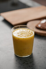 Fresh mango lulo smoothie on kitchen countertop