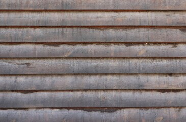Wooden fence background, boards texture. Horizontal striped pattern