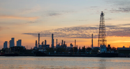 Obraz premium Oil and Gas Industrial zone,The equipment of oil refining,Close-up of industrial pipelines of an oil-refinery plant,Detail of oil pipeline with valves in large oil refinery.