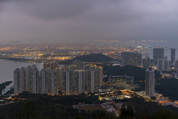 Fototapeta na wymiar Housing estates in the night in Tung Chung, Hong Kong