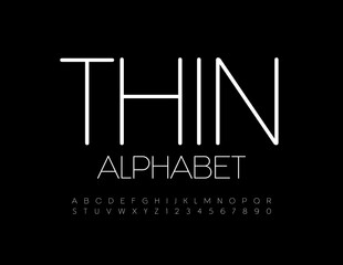 Fototapeta na wymiar Vector Thin Alphabet. White elegant Font. Modern Uppercase Letters and Numbers set