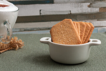 Closeup shot of a small bowl of biscuits